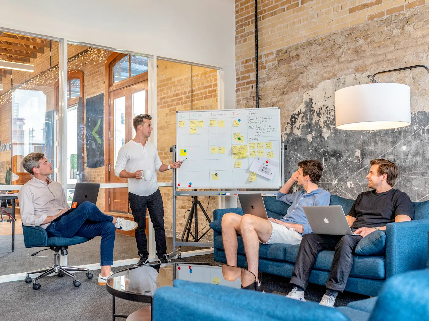 Team planning a growth strategy at a whiteboard